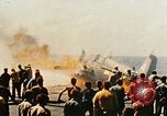 Image of wrecked planes and fire on USS Yorktown World War 2 Pacific Theater, 1944, second 49 stock footage video 65675021565