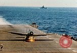 Image of wrecked planes and fire on USS Yorktown World War 2 Pacific Theater, 1944, second 59 stock footage video 65675021565