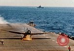 Image of wrecked planes and fire on USS Yorktown World War 2 Pacific Theater, 1944, second 60 stock footage video 65675021565
