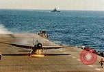 Image of wrecked planes and fire on USS Yorktown World War 2 Pacific Theater, 1944, second 61 stock footage video 65675021565