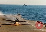 Image of wrecked planes and fire on USS Yorktown World War 2 Pacific Theater, 1944, second 62 stock footage video 65675021565