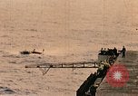 Image of burial at sea aboard USS Yorktown in World War  Pacific Theater, 1944, second 25 stock footage video 65675021567