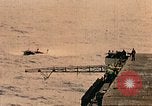 Image of burial at sea aboard USS Yorktown in World War  Pacific Theater, 1944, second 26 stock footage video 65675021567