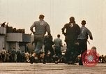 Image of burial at sea aboard USS Yorktown in World War  Pacific Theater, 1944, second 41 stock footage video 65675021567