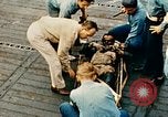 Image of burial at sea aboard USS Yorktown in World War  Pacific Theater, 1944, second 52 stock footage video 65675021567