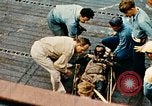 Image of burial at sea aboard USS Yorktown in World War  Pacific Theater, 1944, second 53 stock footage video 65675021567