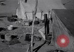 Standbild armen Migranten bäuerlichen Familie im Zelt der Gemeinschaft United States USA, 1939, aus Sekunde 7 historischem Filmmaterial Videoclip 65675021575