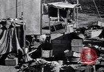 Standbild armen Migranten bäuerlichen Familie im Zelt der Gemeinschaft United States USA, 1939, aus Sekunde 14 historischem Filmmaterial Videoclip 65675021575