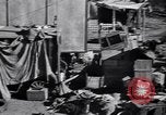 Standbild armen Migranten bäuerlichen Familie im Zelt der Gemeinschaft United States USA, 1939, aus Sekunde 15 historischem Filmmaterial Videoclip 65675021575