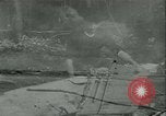 Image of World War II amphibious assault in Pacific Pacific Theater, 1944, second 1 stock footage video 65675021727
