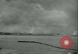 Image of World War II amphibious assault in Pacific Pacific Theater, 1944, second 4 stock footage video 65675021727