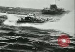 Image of World War II amphibious assault in Pacific Pacific Theater, 1944, second 6 stock footage video 65675021727