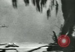 Image of World War II amphibious assault in Pacific Pacific Theater, 1944, second 10 stock footage video 65675021727