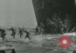 Image of World War II amphibious assault in Pacific Pacific Theater, 1944, second 15 stock footage video 65675021727