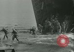 Image of World War II amphibious assault in Pacific Pacific Theater, 1944, second 16 stock footage video 65675021727