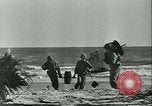 Image of World War II amphibious assault in Pacific Pacific Theater, 1944, second 20 stock footage video 65675021727