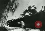 Image of World War II amphibious assault in Pacific Pacific Theater, 1944, second 24 stock footage video 65675021727