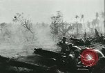 Image of World War II amphibious assault in Pacific Pacific Theater, 1944, second 52 stock footage video 65675021727