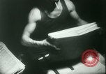 Image of Nazi newspaper printing during Paris occupation Paris France, 1940, second 56 stock footage video 65675021941