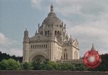 Image of Basilica of St Therese Lisieux France, 1969, second 21 stock footage video 65675022079