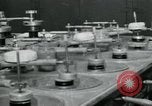 Standbild PrecisionGrinding von Glaslinsen Anaheim California USA, 1960, aus Sekunde 10 historischem Filmmaterial Videoclip 65675022147