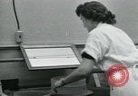 Standbild PrecisionGrinding von Glaslinsen Anaheim California USA, 1960, aus Sekunde 12 historischem Filmmaterial Videoclip 65675022147