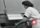Standbild PrecisionGrinding von Glaslinsen Anaheim California USA, 1960, aus Sekunde 13 historischem Filmmaterial Videoclip 65675022147