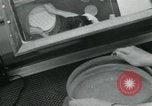 Standbild PrecisionGrinding von Glaslinsen Anaheim California USA, 1960, aus Sekunde 14 historischem Filmmaterial Videoclip 65675022147