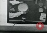 Standbild PrecisionGrinding von Glaslinsen Anaheim California USA, 1960, aus Sekunde 18 historischem Filmmaterial Videoclip 65675022147