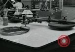 Standbild PrecisionGrinding von Glaslinsen Anaheim California USA, 1960, aus Sekunde 22 historischem Filmmaterial Videoclip 65675022147
