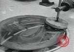 Standbild PrecisionGrinding von Glaslinsen Anaheim California USA, 1960, aus Sekunde 27 historischem Filmmaterial Videoclip 65675022147
