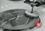 Standbild PrecisionGrinding von Glaslinsen Anaheim California USA, 1960, aus Sekunde 31 historischem Filmmaterial Videoclip 65675022147