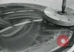 Standbild PrecisionGrinding von Glaslinsen Anaheim California USA, 1960, aus Sekunde 35 historischem Filmmaterial Videoclip 65675022147