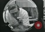 Standbild PrecisionGrinding von Glaslinsen Anaheim California USA, 1960, aus Sekunde 37 historischem Filmmaterial Videoclip 65675022147