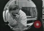Standbild PrecisionGrinding von Glaslinsen Anaheim California USA, 1960, aus Sekunde 38 historischem Filmmaterial Videoclip 65675022147