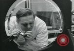 Standbild PrecisionGrinding von Glaslinsen Anaheim California USA, 1960, aus Sekunde 41 historischem Filmmaterial Videoclip 65675022147