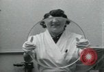 Standbild PrecisionGrinding von Glaslinsen Anaheim California USA, 1960, aus Sekunde 44 historischem Filmmaterial Videoclip 65675022147