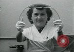 Standbild PrecisionGrinding von Glaslinsen Anaheim California USA, 1960, aus Sekunde 45 historischem Filmmaterial Videoclip 65675022147