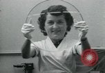 Standbild PrecisionGrinding von Glaslinsen Anaheim California USA, 1960, aus Sekunde 47 historischem Filmmaterial Videoclip 65675022147