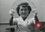 Standbild PrecisionGrinding von Glaslinsen Anaheim California USA, 1960, aus Sekunde 48 historischem Filmmaterial Videoclip 65675022147