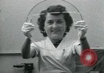 Standbild PrecisionGrinding von Glaslinsen Anaheim California USA, 1960, aus Sekunde 49 historischem Filmmaterial Videoclip 65675022147