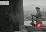 Image of US troops in makeshift shelters during Korean War South Korea, 1951, second 13 stock footage video 65675022170