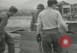 Image of US troops in makeshift shelters during Korean War South Korea, 1951, second 26 stock footage video 65675022170