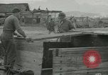 Image of US troops in makeshift shelters during Korean War South Korea, 1951, second 33 stock footage video 65675022170