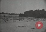 Standbild Arbeiter machen Datum Blatt Taschen Mandali Irak, 1929, aus Sekunde 49 historischem Filmmaterial Videoclip 65675022177