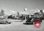 Image of Traffic policeman under umbrella Baghdad Iraq, 1942, second 3 stock footage video 65675022192