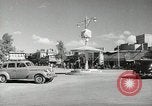 Image of Traffic policeman under umbrella Baghdad Iraq, 1942, second 4 stock footage video 65675022192