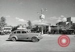 Image of Traffic policeman under umbrella Baghdad Iraq, 1942, second 5 stock footage video 65675022192