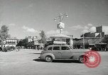 Image of Traffic policeman under umbrella Baghdad Iraq, 1942, second 6 stock footage video 65675022192