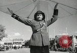 Image of Traffic policeman under umbrella Baghdad Iraq, 1942, second 11 stock footage video 65675022192
